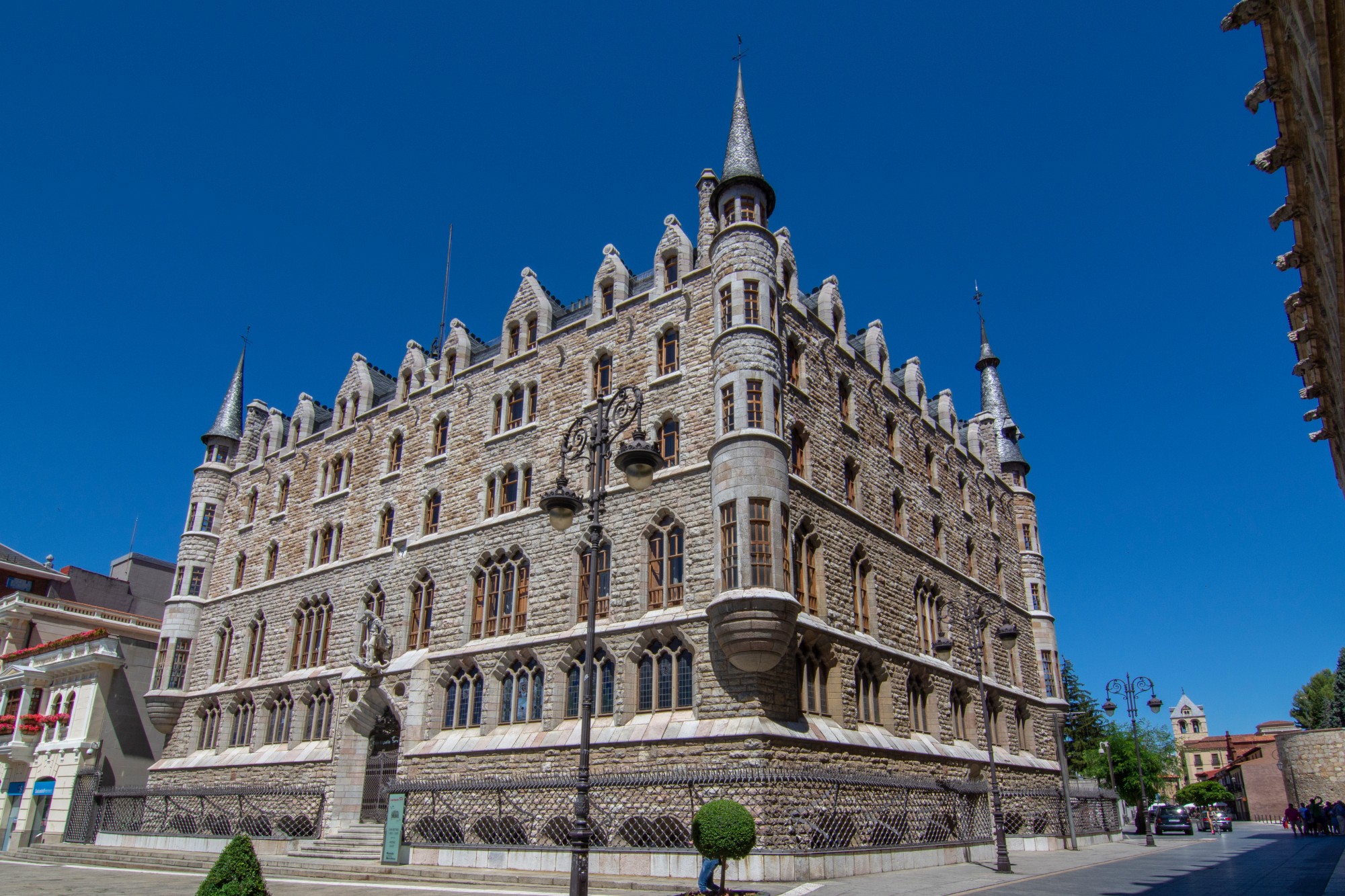 Leon, Spain, July 2016: Tourist visiting Botines Palace and Guzmanes Palace in Leon was built by famous spanish architect Antoni Gaudi
